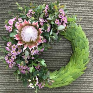WREATH ~ Designer : Alice Stallworthy, Wildflowers Australia competition ~ Flowers & Foliage : waxflower, king protea, leucadendron, gum