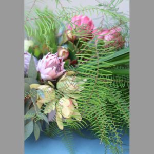 ARRANGEMENT ~ Designer : Britte Sunde, Beautiflora ~ Foliage & Flowers : Sea Star Fern™, Aussie Typha™, king protea, leucadendron, gum
